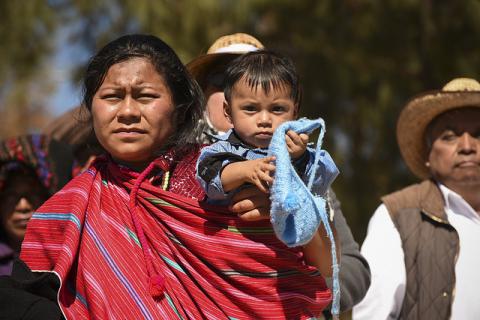 Indigenous mother and child at papal Mass in Mexico