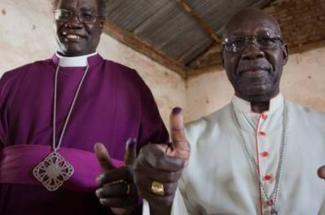 Archbishop Daniel Deng Bul of the Episcopal Church of Sudan (left) and Catholic Archbishop Paulino Lukudu Loro