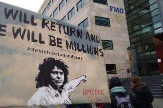Berta Caceres demonstration at building of bank funder of dam