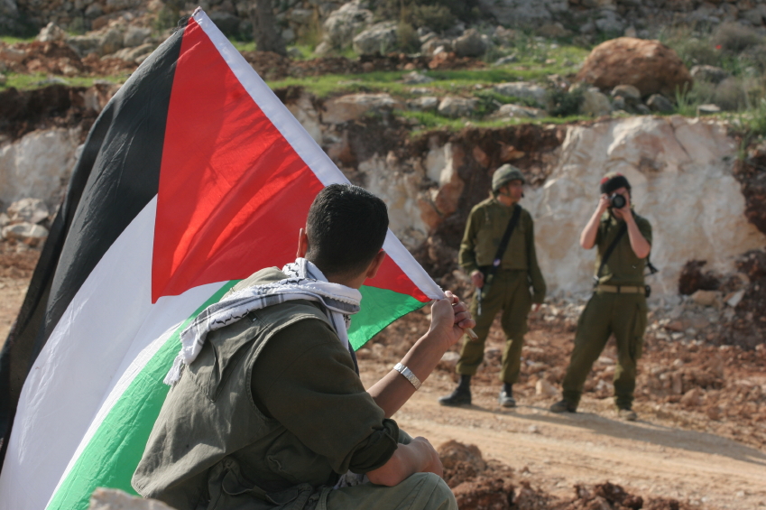 boy with pales flag