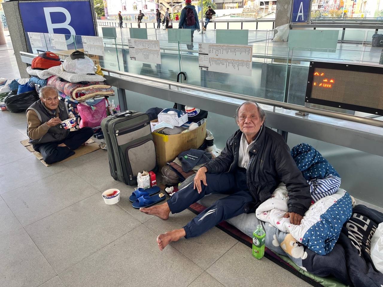 Photo of Paschal Madukwa's unhoused friends at the Taichung Train Station enjoying their meals courtesy of Paschal Madukwa.